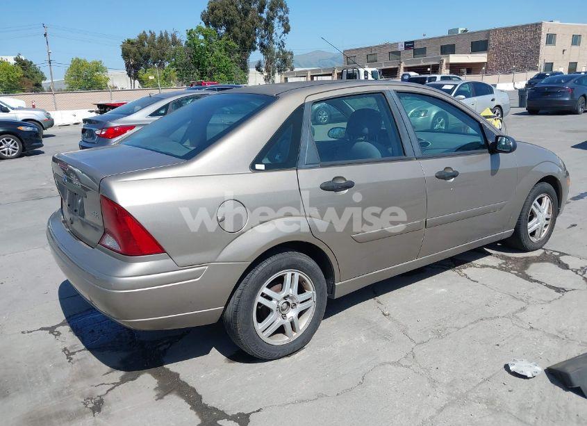 Photo 4 of 2004 Ford Focus SE (VIN 1FAFP34354W103841)
