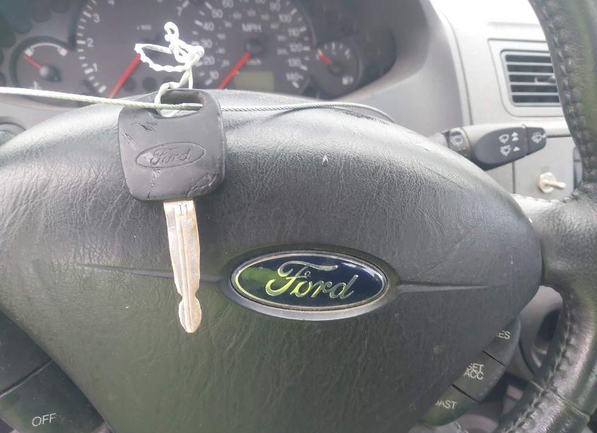 Photo 11 of 2005 Ford Focus ZX4 (VIN 1FAFP34NX5W188937)