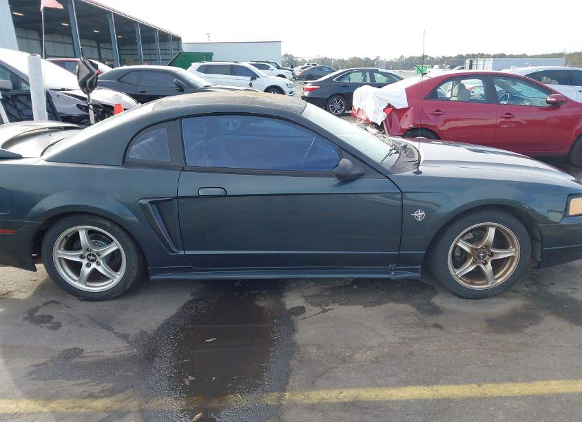 Photo 13 of 1999 Ford Mustang (VIN 1FAFP4040XF140286)