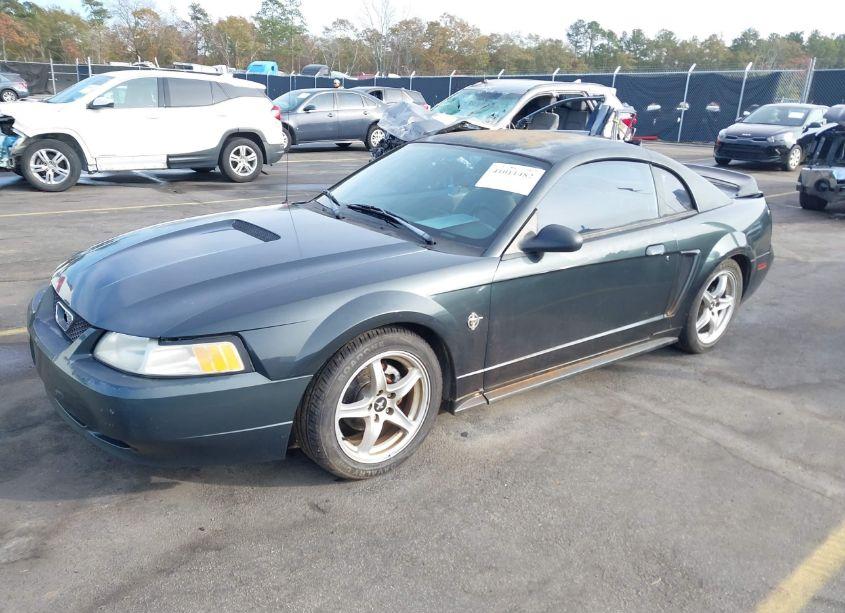 Photo 2 of 1999 Ford Mustang (VIN 1FAFP4040XF140286)