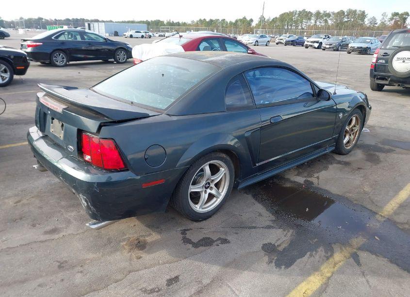 Photo 4 of 1999 Ford Mustang (VIN 1FAFP4040XF140286)