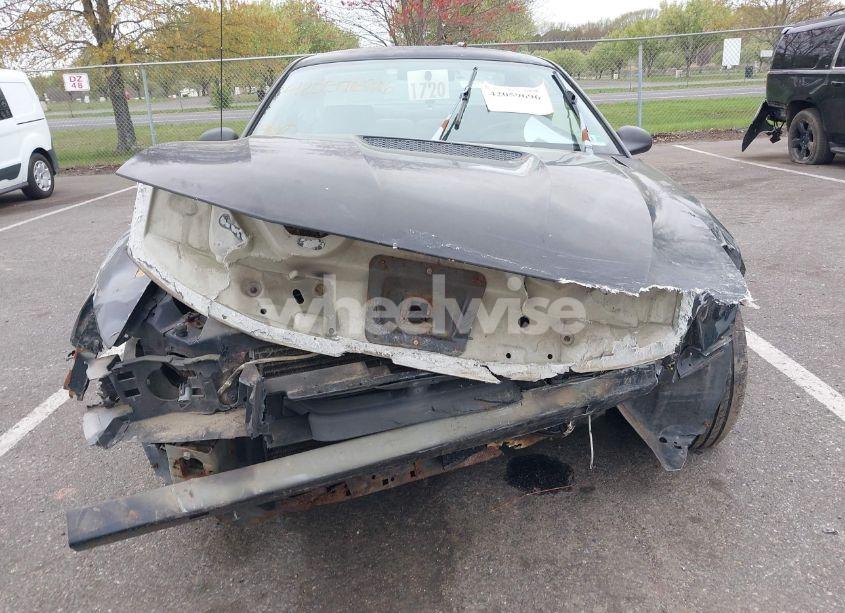 Photo 12 of 1999 Ford Mustang (VIN 1FAFP4040XF157766)