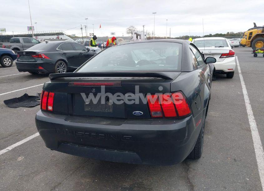 Photo 4 of 1999 Ford Mustang (VIN 1FAFP4040XF157766)