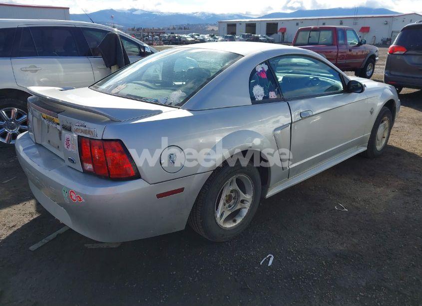 Photo 4 of 1999 Ford Mustang (VIN 1FAFP4049XF132042)