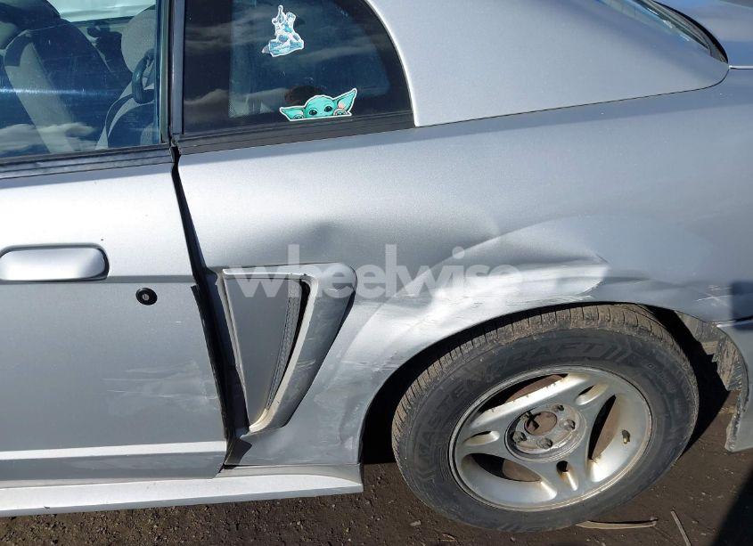 Photo 6 of 1999 Ford Mustang (VIN 1FAFP4049XF132042)