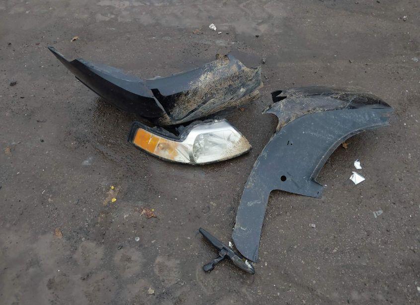 Photo 12 of 1999 Ford Mustang (VIN 1FAFP404XXF154115)