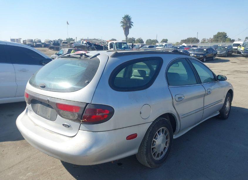 Photo 4 of 1999 Ford Taurus SE (VIN 1FAFP58S1XA129027)
