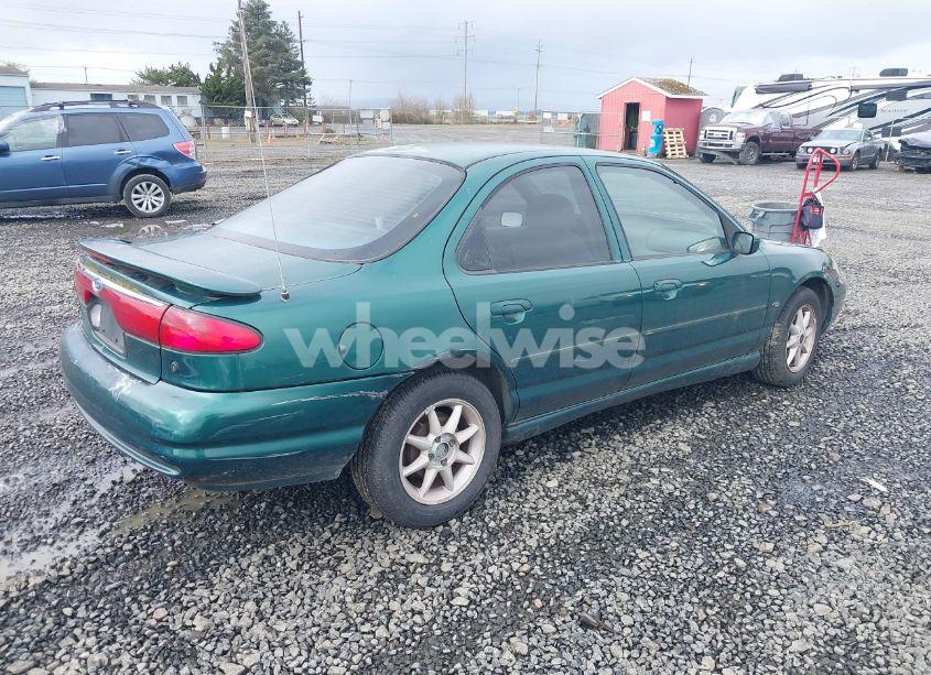 Photo 4 of 1999 Ford Contour SE (VIN 1FAFP66L3XK227522)