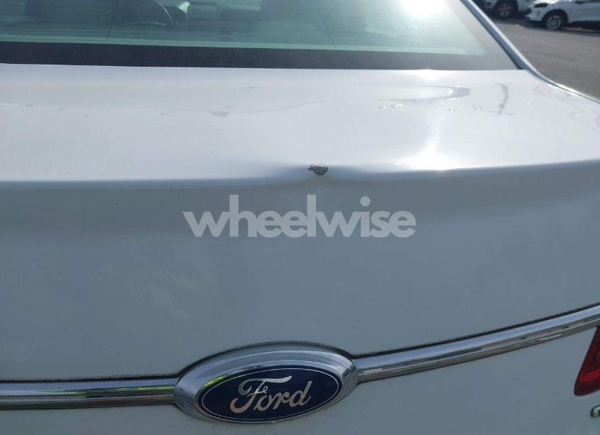 Photo 6 of 2015 Ford Taurus SE (VIN 1FAHP2D80FG150996)
