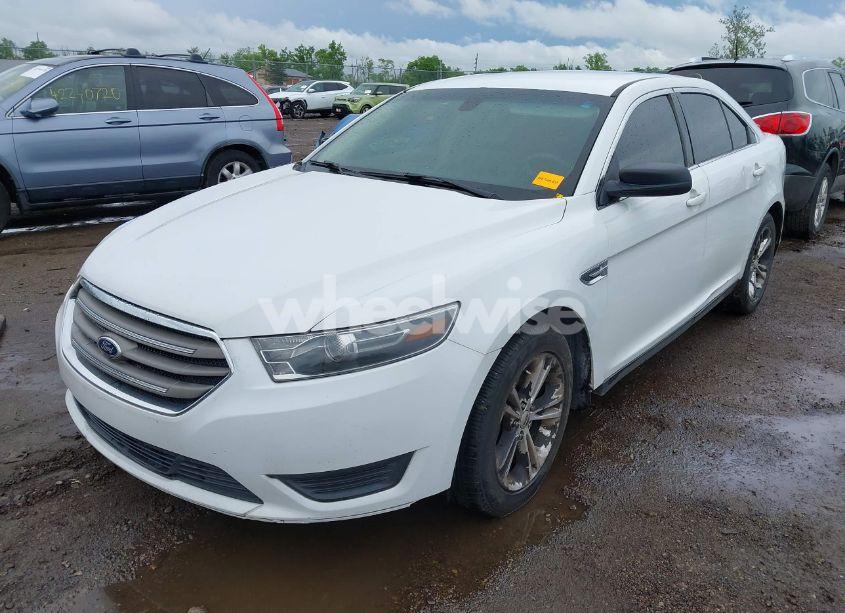 Photo 2 of 2016 Ford Taurus SE (VIN 1FAHP2D80GG100939)