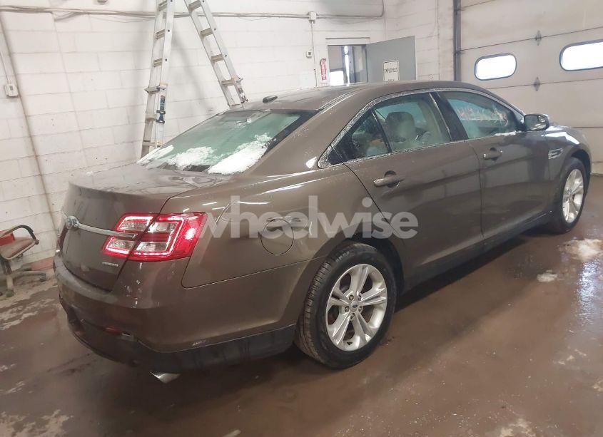 Photo 4 of 2016 Ford Taurus SE (VIN 1FAHP2D81GG158476)