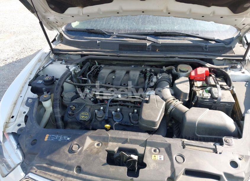 Photo 10 of 2016 Ford Taurus SE (VIN 1FAHP2D85GG148999)