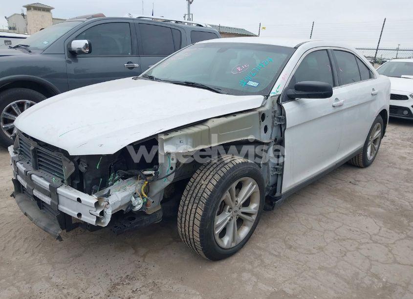 Photo 2 of 2017 Ford Taurus SE (VIN 1FAHP2D86HG125815)