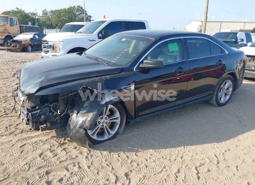 Photo 2 of 2016 Ford Taurus SE (VIN 1FAHP2D8XGG129543)