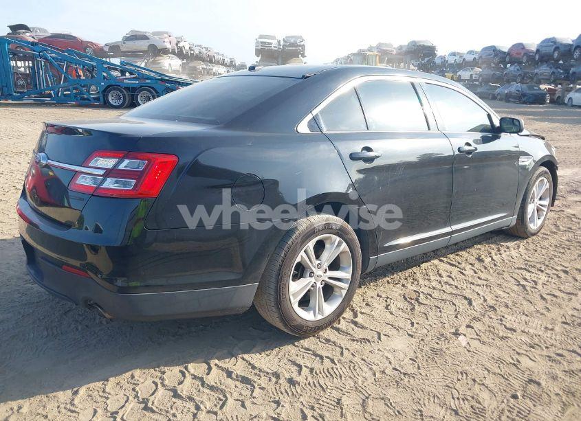 Photo 4 of 2016 Ford Taurus SE (VIN 1FAHP2D8XGG129543)