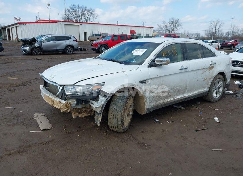Photo 2 of 2016 Ford Taurus SE (VIN 1FAHP2D8XGG146830)