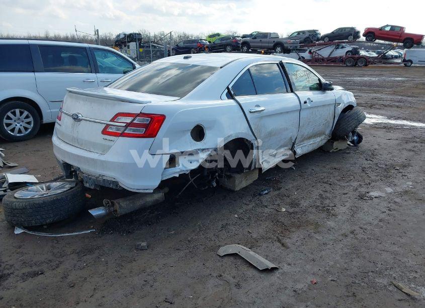 Photo 4 of 2016 Ford Taurus SE (VIN 1FAHP2D8XGG146830)