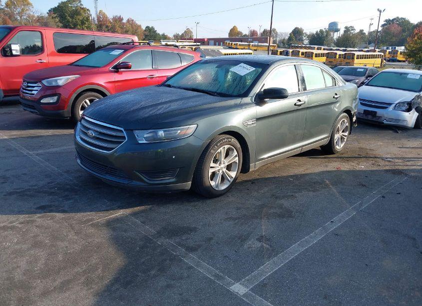 Photo 2 of 2016 Ford Taurus SE (VIN 1FAHP2D99GG104786)