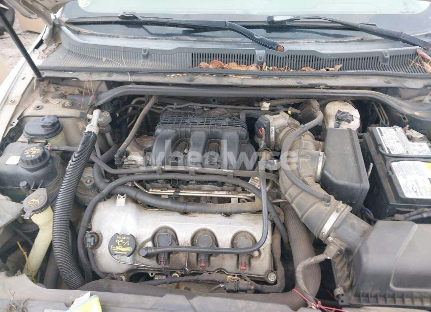 Photo 10 of 2011 Ford Taurus SE (VIN 1FAHP2DW6BG100869)