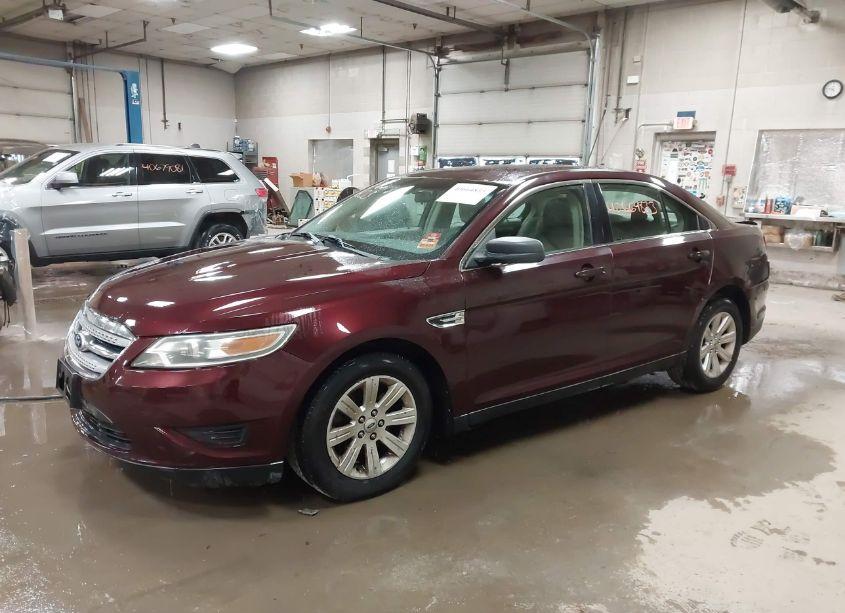 Photo 2 of 2011 Ford Taurus SE (VIN 1FAHP2DW7BG115980)
