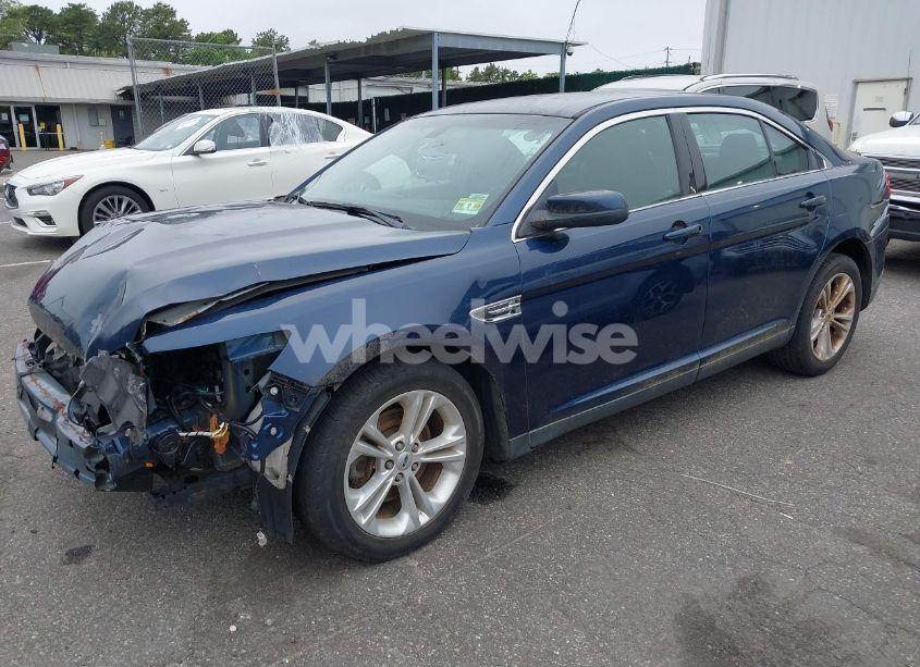 Photo 2 of 2016 Ford Taurus SEL (VIN 1FAHP2E81GG111690)