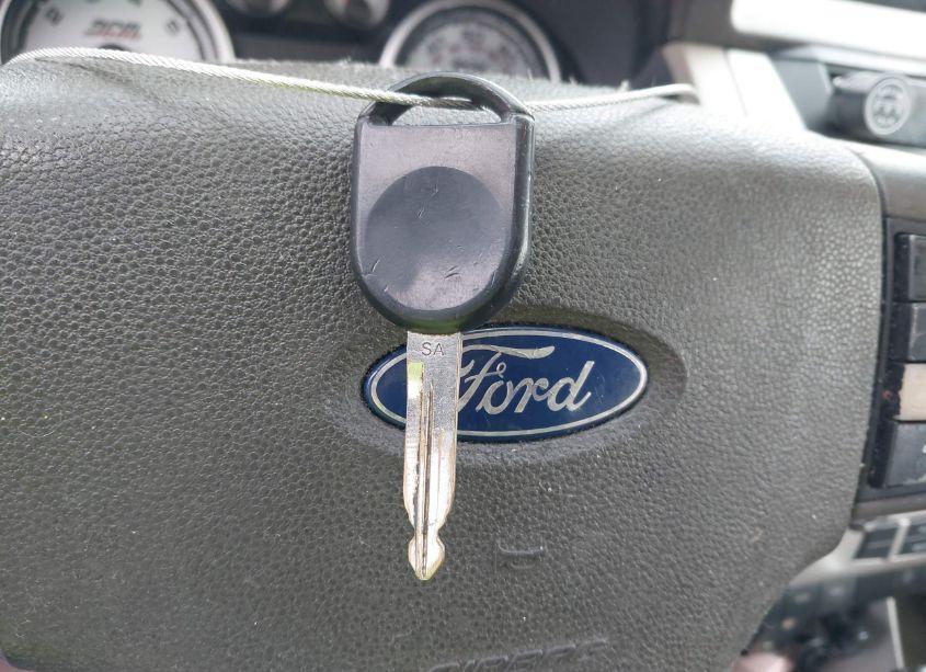 Photo 11 of 2009 Ford Focus SE (VIN 1FAHP35N69W254851)