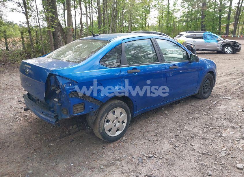 Photo 4 of 2011 Ford Focus S (VIN 1FAHP3EN3BW124922)