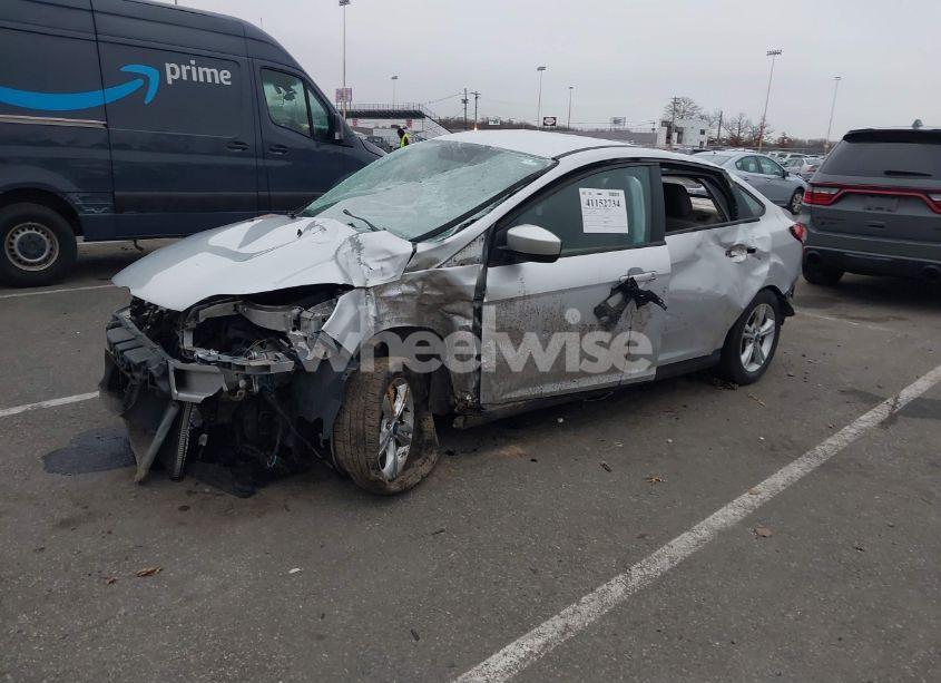 Photo 2 of 2012 Ford Focus SE (VIN 1FAHP3F22CL303458)