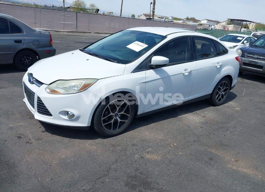 Photo 2 of 2012 Ford Focus SE (VIN 1FAHP3F24CL462319)