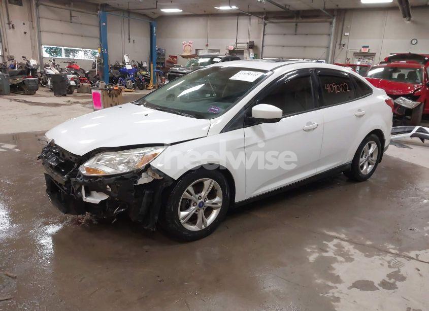 Photo 2 of 2012 Ford Focus SE (VIN 1FAHP3F26CL209423)