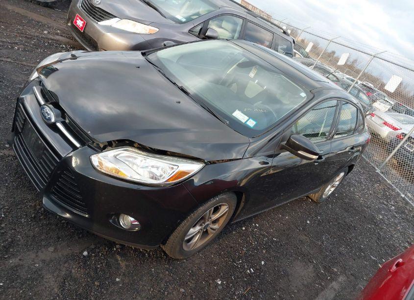 Photo 2 of 2012 Ford Focus SE (VIN 1FAHP3F28CL442378)