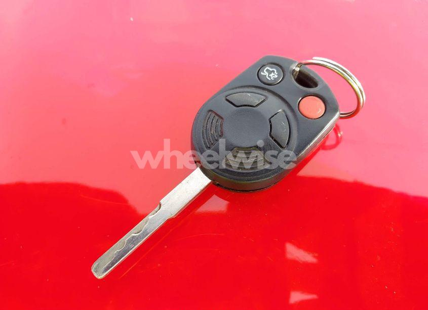 Photo 11 of 2012 Ford Focus SE (VIN 1FAHP3F29CL128254)