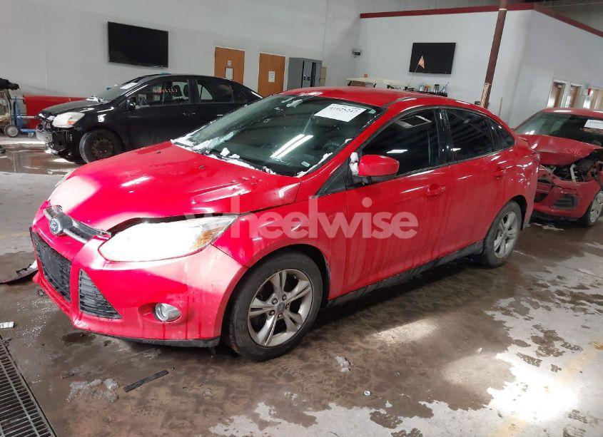 Photo 2 of 2012 Ford Focus SE (VIN 1FAHP3F2XCL470568)