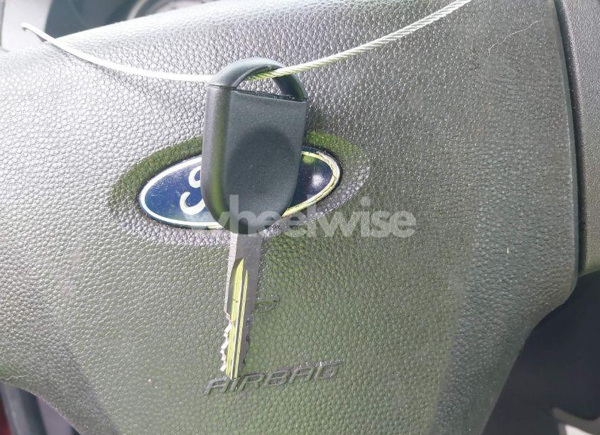 Photo 11 of 2010 Ford Focus SE (VIN 1FAHP3FN0AW218415)