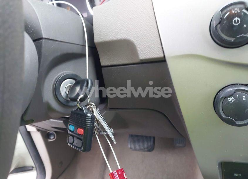 Photo 11 of 2010 Ford Focus SE (VIN 1FAHP3FN0AW264472)