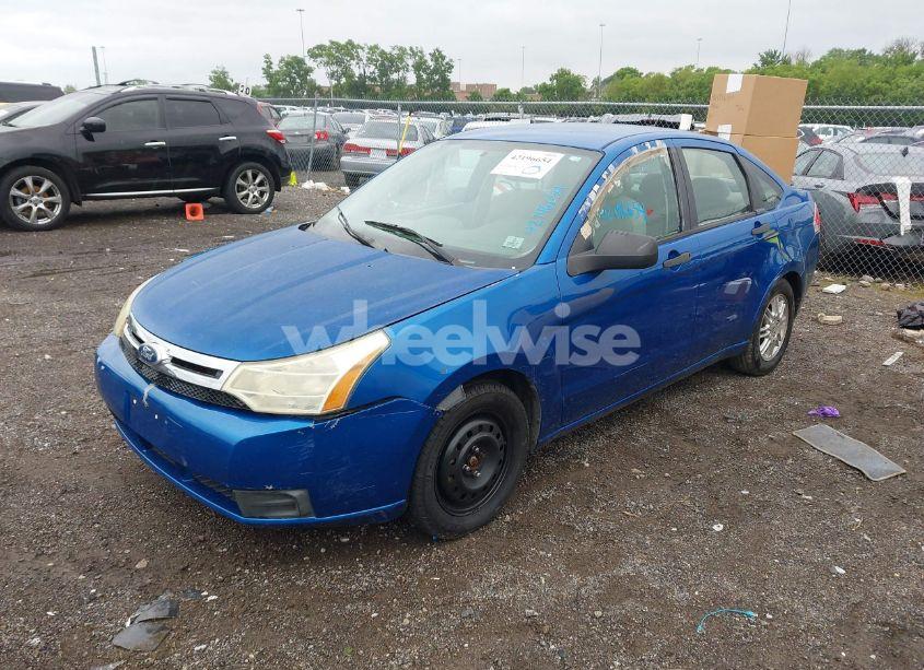 Photo 2 of 2010 Ford Focus SE (VIN 1FAHP3FN1AW264450)