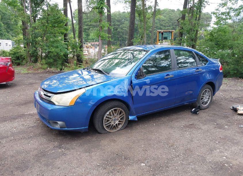 Photo 2 of 2010 Ford Focus SE (VIN 1FAHP3FN1AW275206)