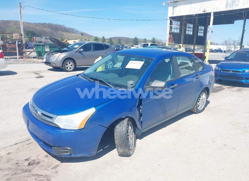 Photo 2 of 2011 Ford Focus SE (VIN 1FAHP3FN2BW111187)