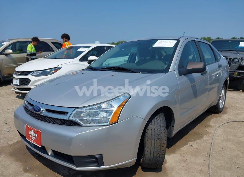 Photo 2 of 2011 Ford Focus SE (VIN 1FAHP3FN5BW130977)