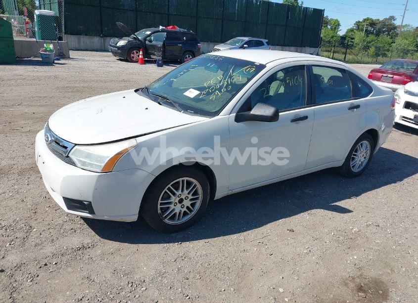 Photo 2 of 2011 Ford Focus SE (VIN 1FAHP3FN7BW172857)