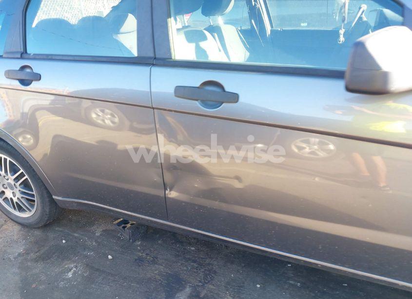 Photo 12 of 2011 Ford Focus SE (VIN 1FAHP3FN8BW199999)