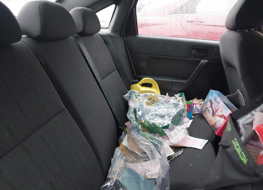 Photo 8 of 2011 Ford Focus SE (VIN 1FAHP3FN9BW128598)