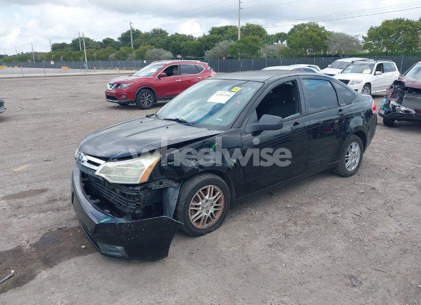 Photo 2 of 2011 Ford Focus SE (VIN 1FAHP3FN9BW180880)