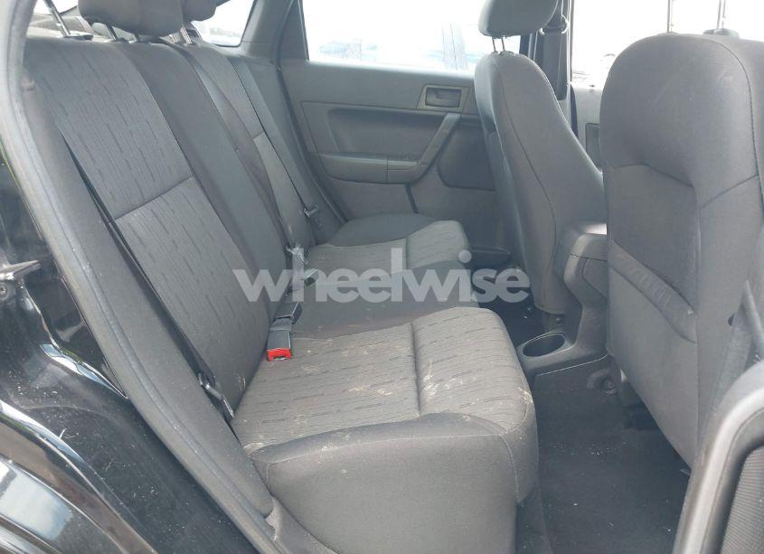 Photo 8 of 2011 Ford Focus SE (VIN 1FAHP3FN9BW180880)