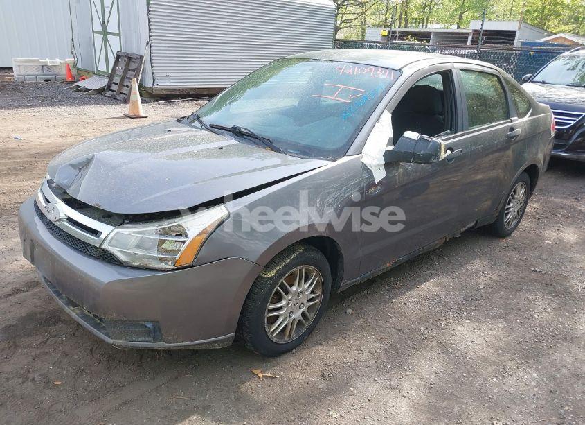 Photo 2 of 2010 Ford Focus SE (VIN 1FAHP3FNXAW125238)