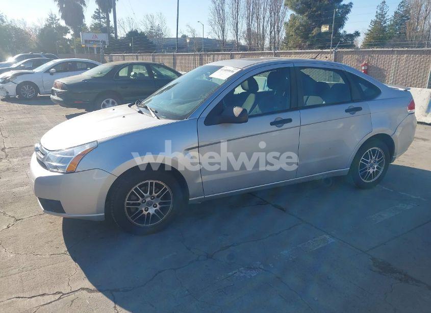 Photo 2 of 2010 Ford Focus SE (VIN 1FAHP3FNXAW174634)