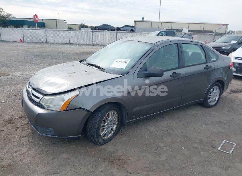 Photo 2 of 2010 Ford Focus SE (VIN 1FAHP3FNXAW251115)