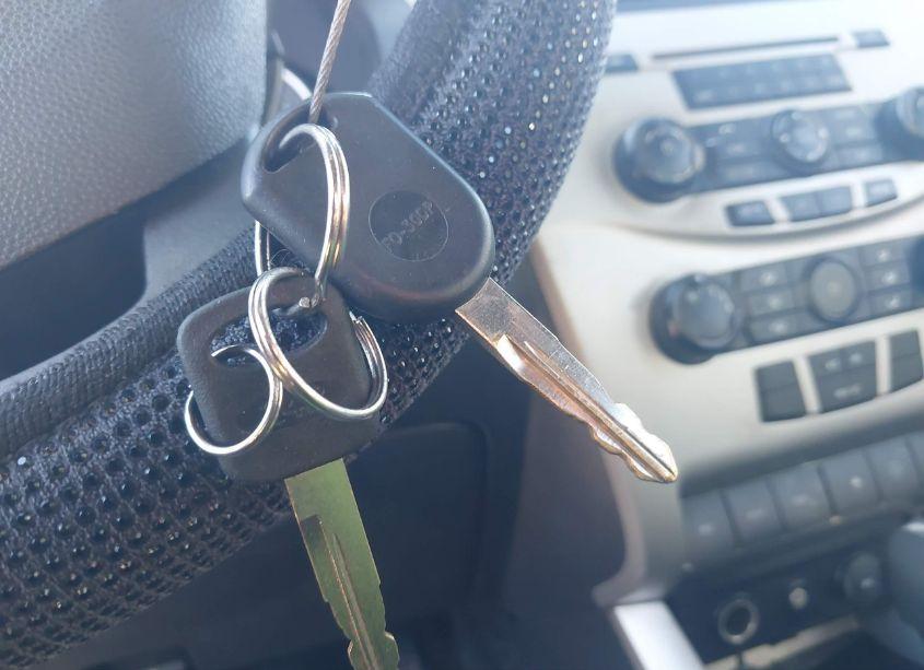 Photo 11 of 2011 Ford Focus SE (VIN 1FAHP3FNXBW136757)