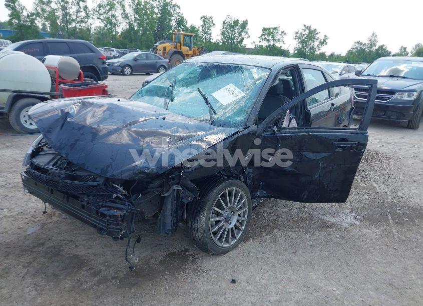 Photo 2 of 2010 Ford Focus SES (VIN 1FAHP3GNXAW277809)