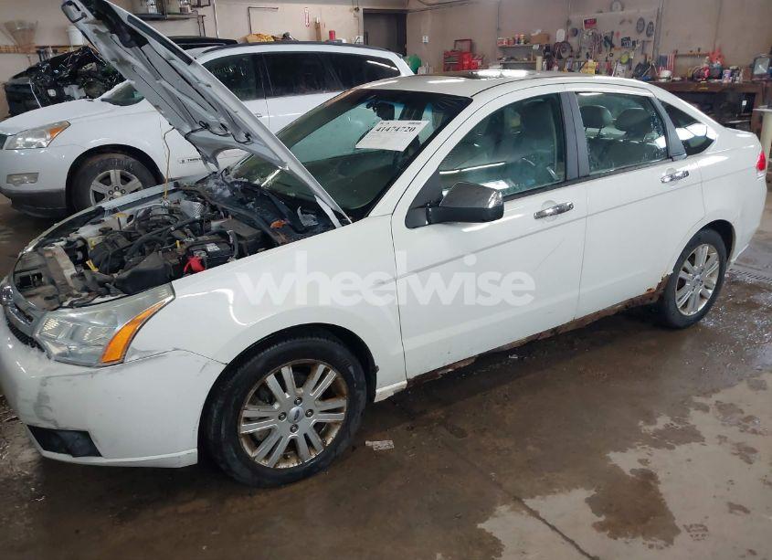 Photo 2 of 2010 Ford Focus SEL (VIN 1FAHP3HNXAW208228)